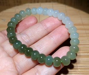 新疆的猫zg010601  20.5克，油润晴水色和田玉渐变算盘珠手串