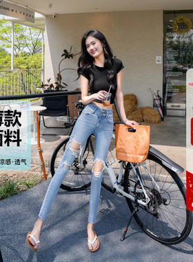 2026夏季薄款大破洞小脚牛仔裤女浅蓝色两粒扣高腰修身显瘦铅笔裤