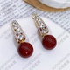 铜合金合成锆石耳饰 暮冬黄昏KL034精致红色喜庆过年两戴珠珠耳环