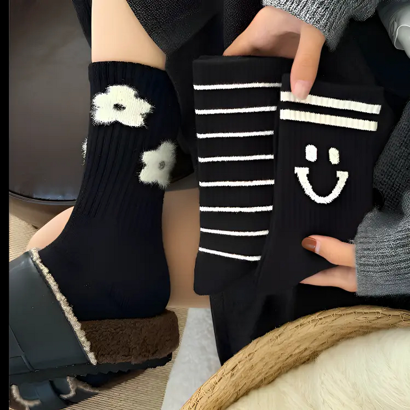 黑色羊绒厚袜子女中筒袜