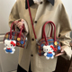HelloKitty儿童包包女格子纹蝴蝶结手提包宝宝可爱毛绒挂件斜挎包
