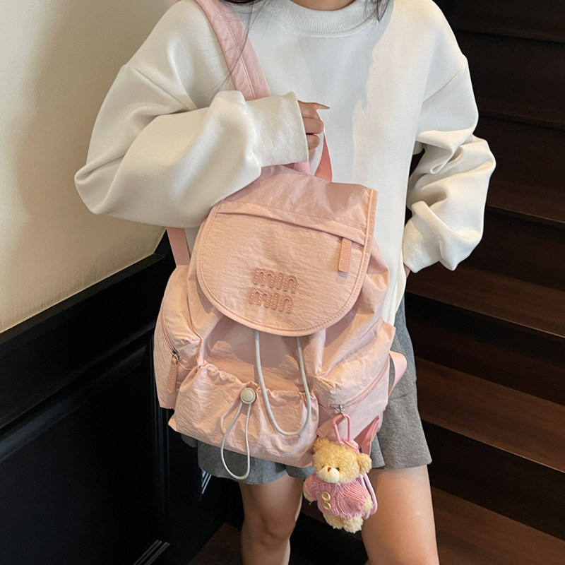 2025韩版新款时尚街头休闲抽绳翻盖双肩背包出游通勤女尼龙帆布包