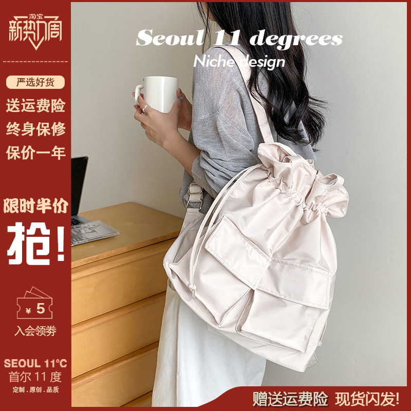 小众高级感抽绳双肩包多口袋轻便帆布包手提水桶包尼龙单肩斜挎包