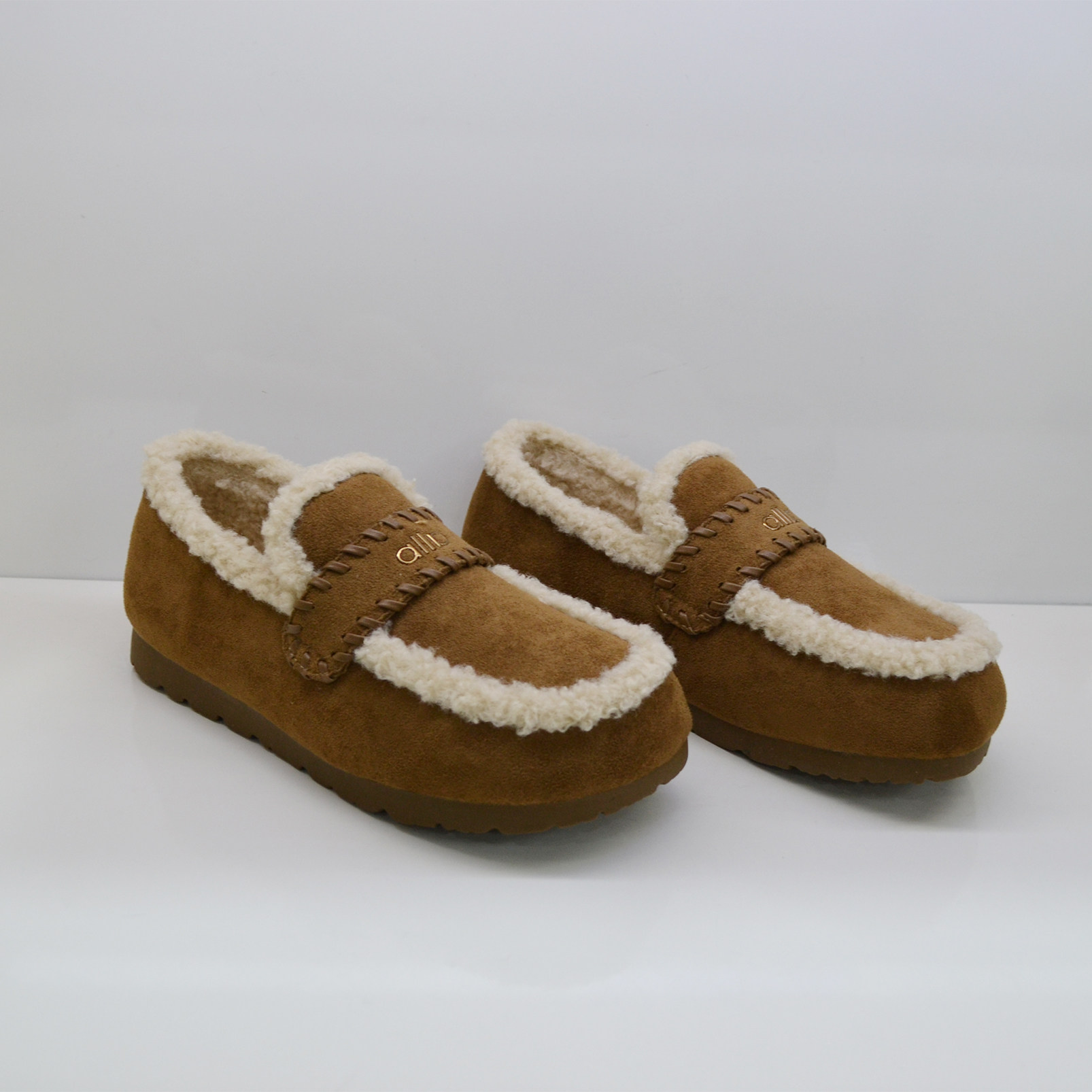 冰洁女鞋2025冬季新款圆头平跟软底舒适百搭豆豆鞋女毛毛鞋598302