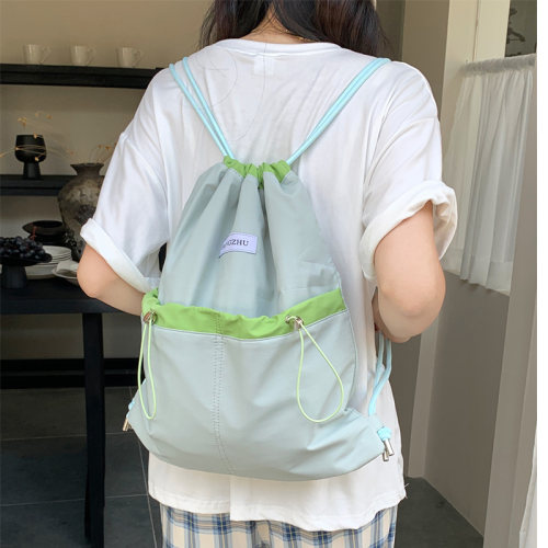 束口休闲背包便携旅行水桶包女