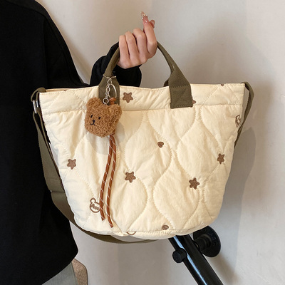 小手拎包女2024新款冬季棉服包可爱简约小包包便携羽绒服包手提包