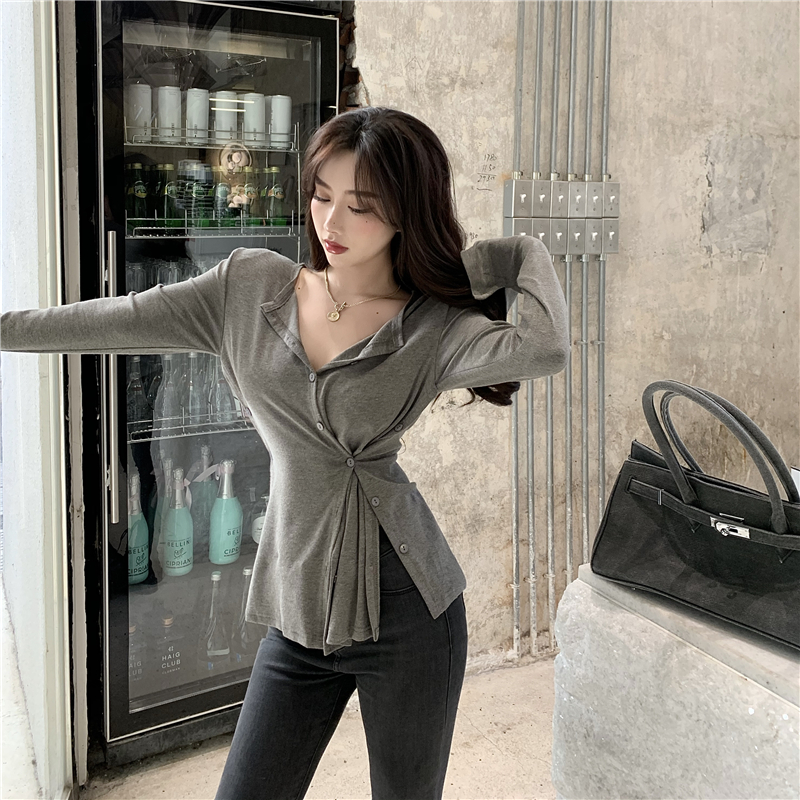Ins super fire shoulder pad Top Long Sleeve T-Shirt women's irregular waist button bottoming shirt 2020 trend