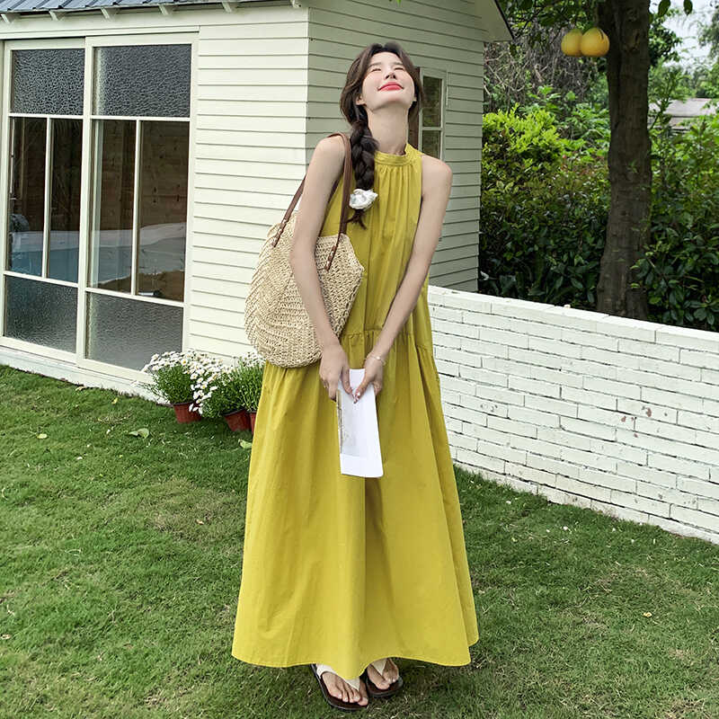 超火好看黄色挂脖吊带连衣裙女春夏2025新款独特绝美法式温柔长裙图片