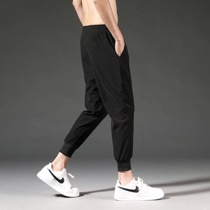 2022裤子男潮牌哈伦束脚裤春季新款百搭休闲运动裤男ins潮牌卫裤图片