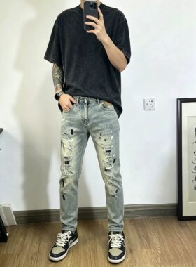 2026精神小伙设计感破洞涂鸦小脚牛仔裤男修身直筒长裤潮流轻奢款