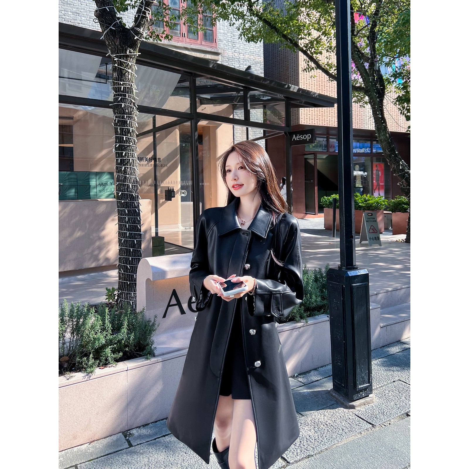 专柜正品轻奢通勤皮夹克女中长款2025秋季宽松黑色套装Pu风衣外套