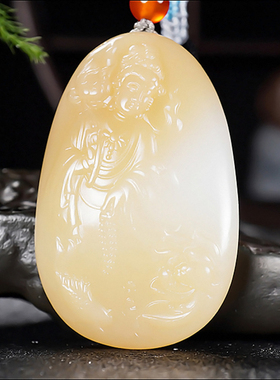 新疆冯立辉作品和田玉且末金山料蜜糖色糖羊脂白玉观音33.93克