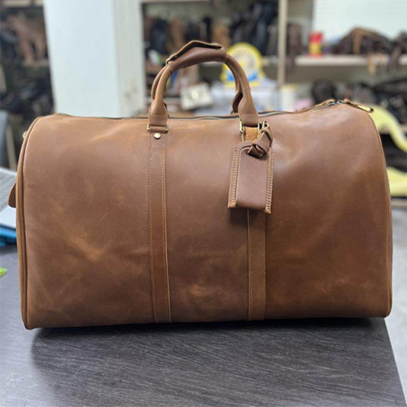 真皮手提大容量多用途男士旅行包出差登机免托运开车家用行李包袋