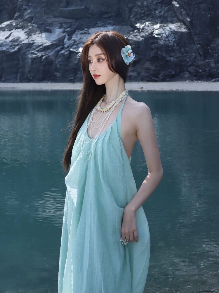 出租海边度假风v领挂脖连衣裙子女夏季感茶歇绿色漏背不规则长裙