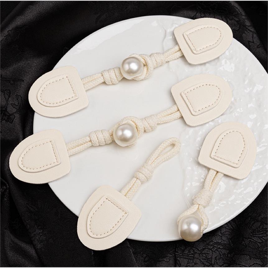 手工编织牛角皮对扣珍珠牛角扣大衣外套装饰扣毛呢羊羔绒纽扣辅料