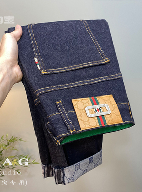 深蓝色牛仔裤男秋季新款高端轻奢休闲长裤微哈伦印花小直脚男裤子