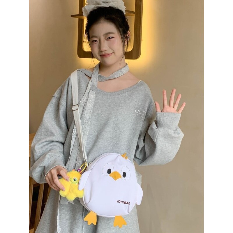 韩国明星同款可爱企鹅卡通小书包女帆布斜挎包女百搭ins少女夏季