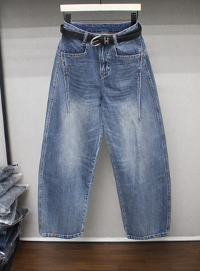 欧洲站蓝色水洗宽松牛仔弯刀裤2026年春季新款女显瘦阔腿裤99606