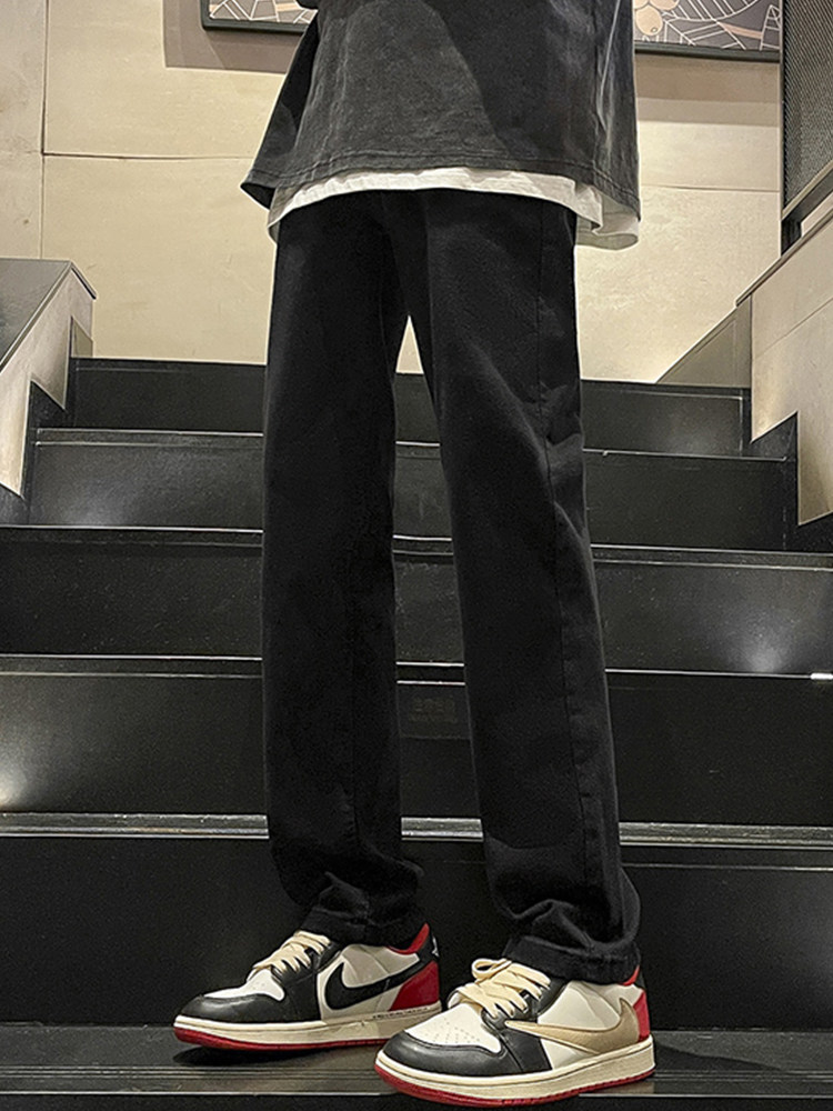 黑色长裤直筒水洗牛仔裤