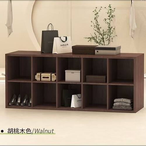 服装店中岛桌中间摆放流水童装收纳陈列柜女装包店格子柜