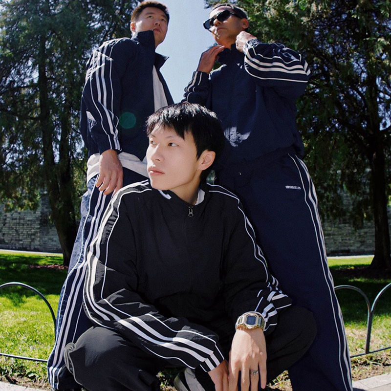 UNSHACKLED潮牌简约复古梭织侧条运动套装杨政透气宽松上衣休闲裤