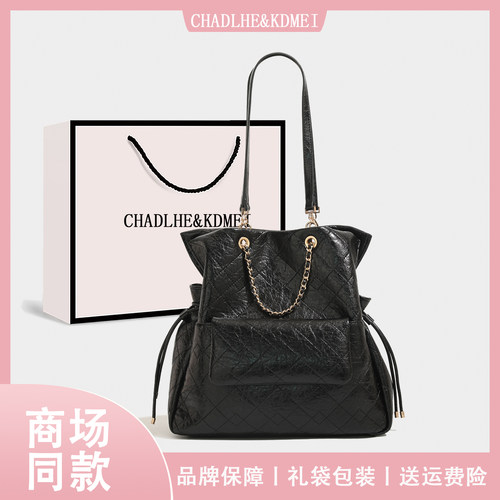 学院风油蜡皮菱格链条双肩包女2025新款大容量通勤抽绳福袋包背包