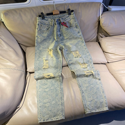 重工满印提花破洞牛仔裤男