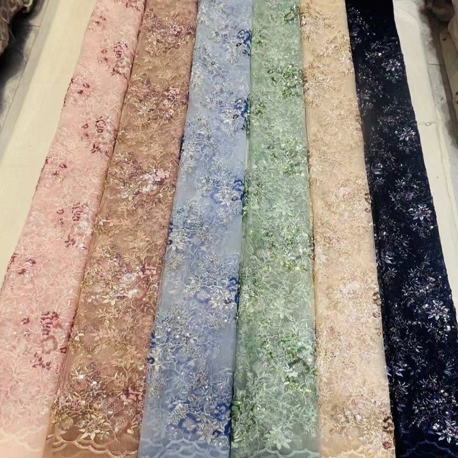 N106跨境彩色珠绣亮片立体刺绣网纱面料制衣洋服布料粉色可剪花