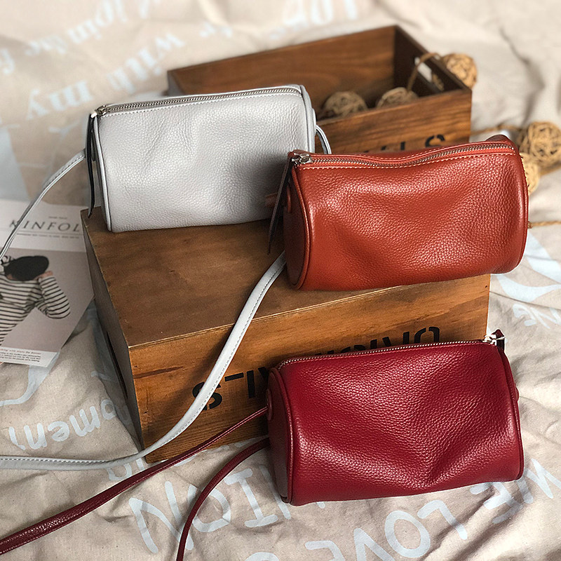 mood妙迪2020新款潮真皮圆筒包mini迷你枕头包软皮单肩斜挎小包包