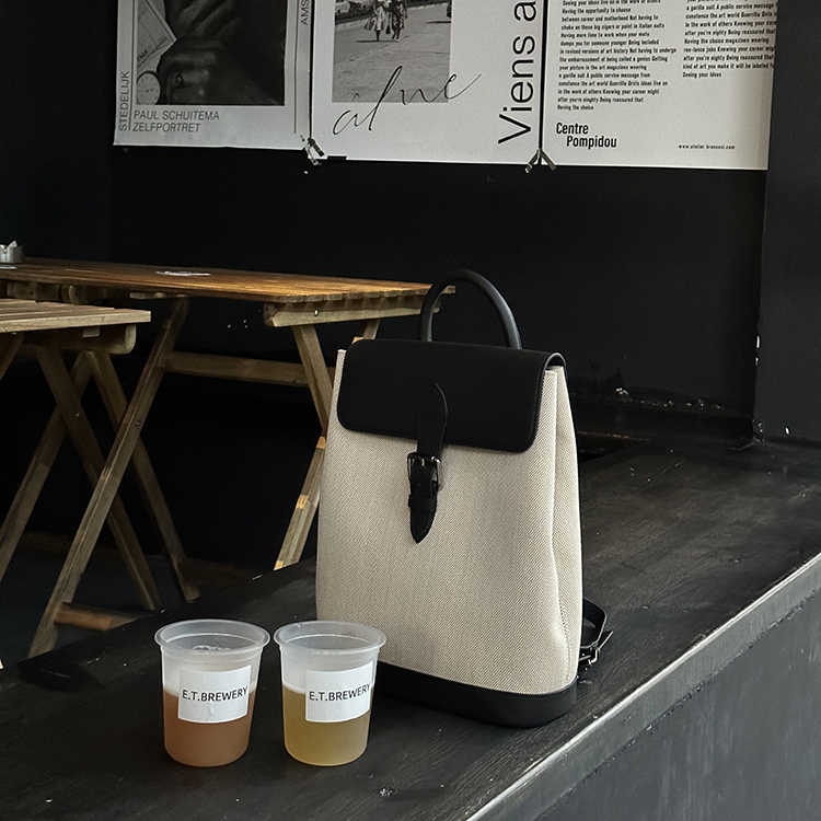 dounded休闲简约款双肩包