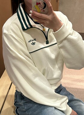 阿迪达斯 三叶草 女款运动休闲宽松保暖半拉链套头衫卫衣 JM8014