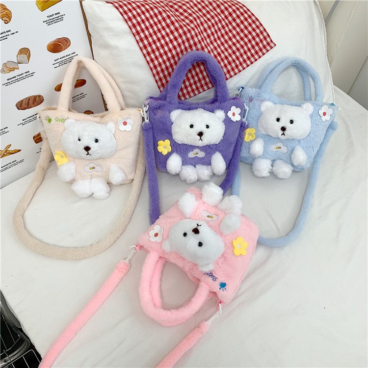 新款卡通时尚女孩毛绒斜跨手提包女生收纳小包包水桶包手机化妆包