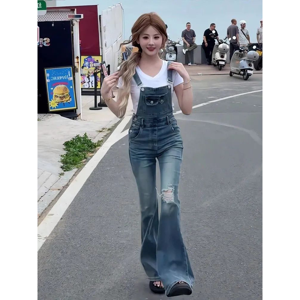美式复古破洞牛仔背带裤女夏季高街设计感宽松显瘦微喇叭连体裤子
