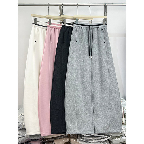 韩系设计感拼色腰头休闲卫裤女春秋新款铆钉百搭运动束脚弯刀长裤