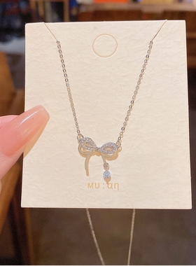 搜搜新款双层蝴蝶结钛钢项链女ins潮轻奢小众锆石精致锁骨链批发