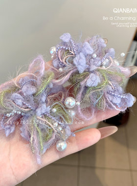 甜美毛绒紫色花朵蝴蝶侧边夹女