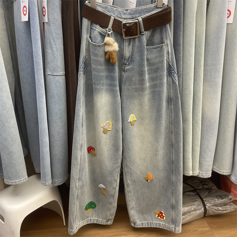 韩版彩色蘑菇毛巾刺绣设计时髦牛仔裤女2025冬季新款卡通减龄长裤