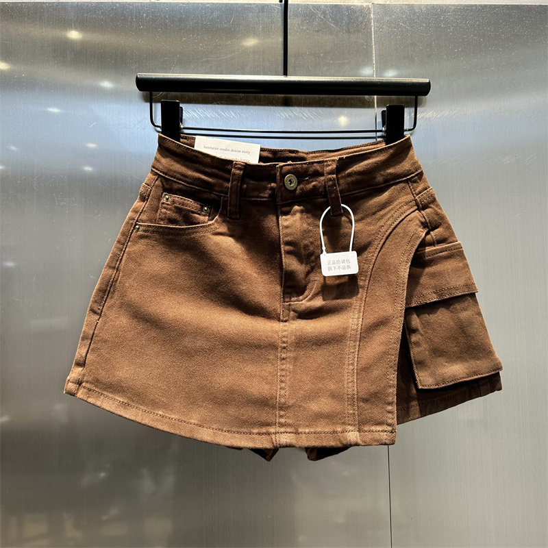 韩版2025早秋新款咖啡色不规则拼接设计牛仔裙裤时髦百搭a字短裙