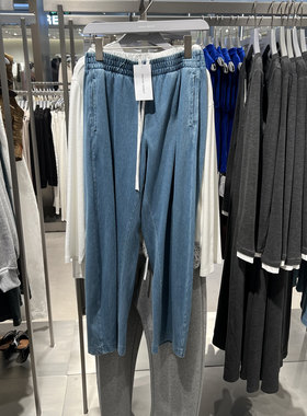 UR国内2026春季女装潮流撞色拼接系带弯刀牛仔长裤UWJ860042