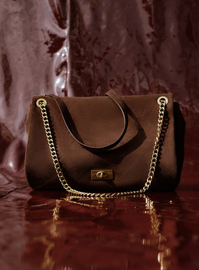 UR国内2025秋季女士时髦气质琥珀流光风单肩斜挎包UAWB50237