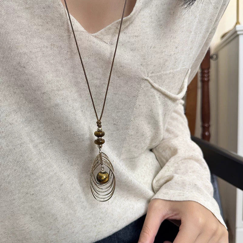 复古美拉德雀羽虎眼石项链女款2026新款小众设计高级感毛衣链配饰