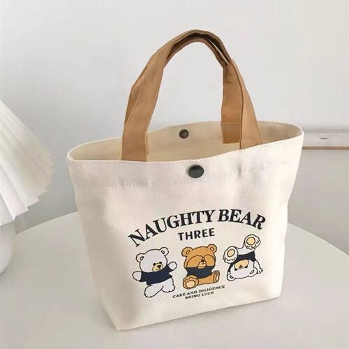 小熊帆布袋优惠学生上班族百搭饭盒简约便当手提小包包女杜邦纸袋