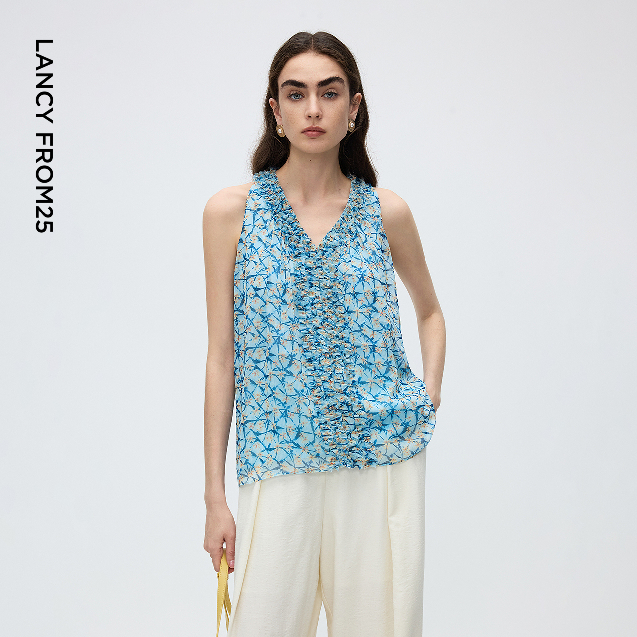 印花图案 无袖V领 木耳边设计