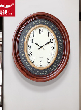 枫叶钟表欧式家用实木轻奢简约挂钟客厅潮流现代大气椭圆装饰时钟