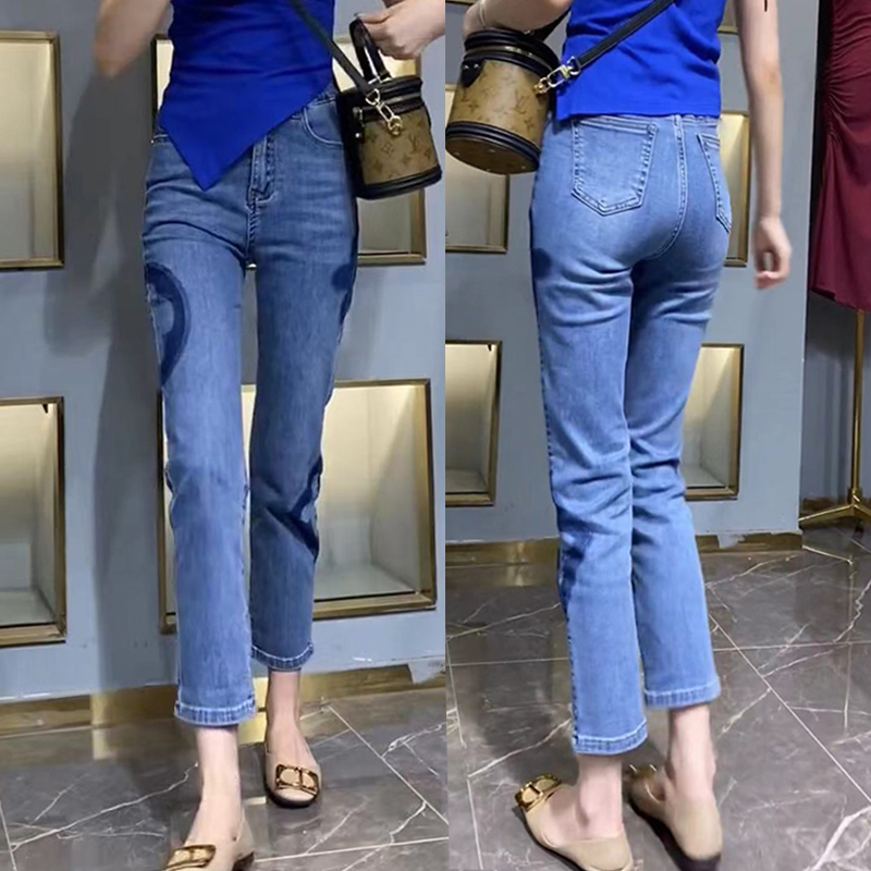 大码女装裤子高腰九分牛仔裤女2025新款胖妹妹弹力显瘦印花烟管裤