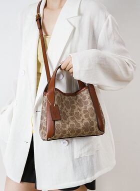 Clean Knоck水桶包包女2026新款手提菜篮子包百搭印花单肩斜挎包