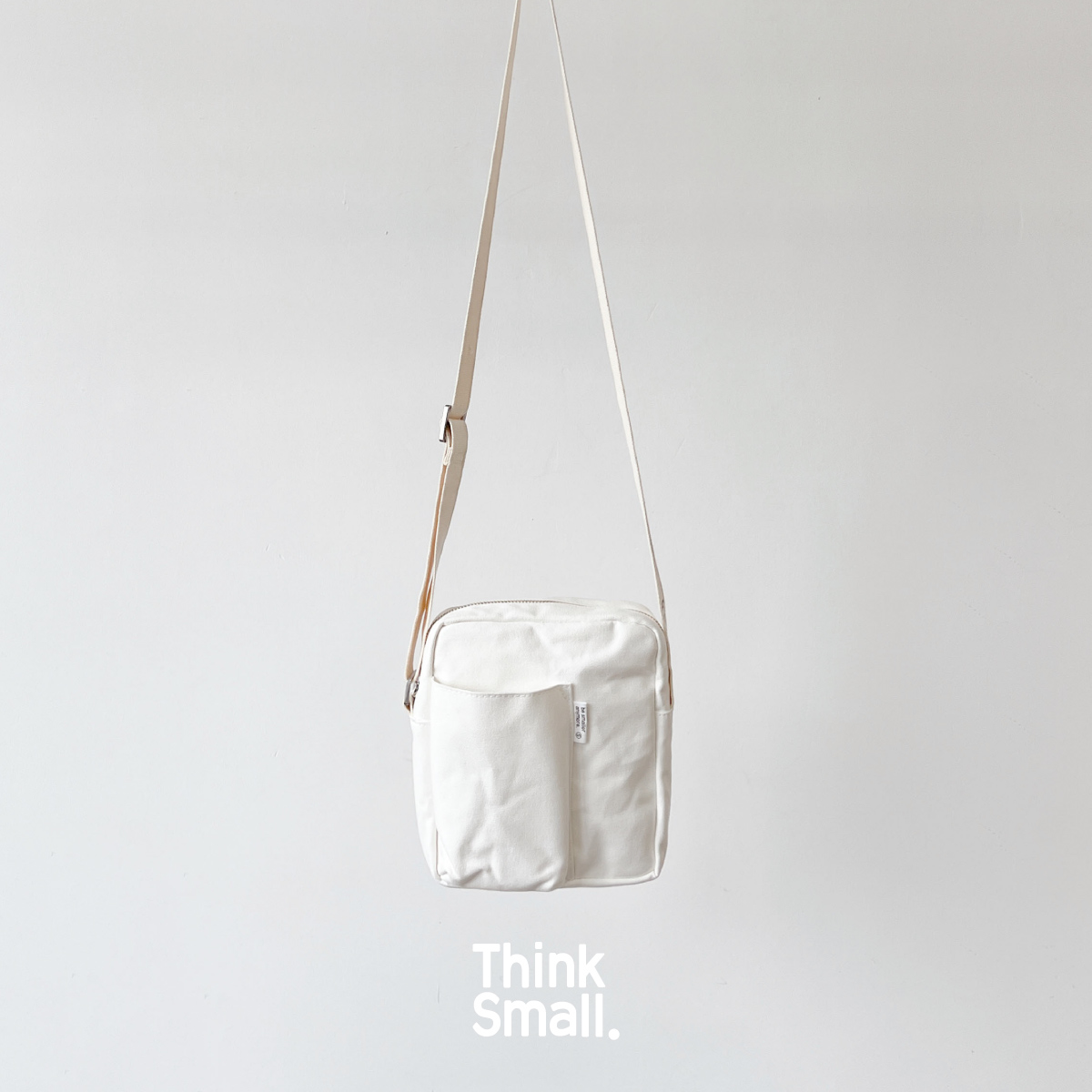 小容量简约百搭高密帆布斜挎包