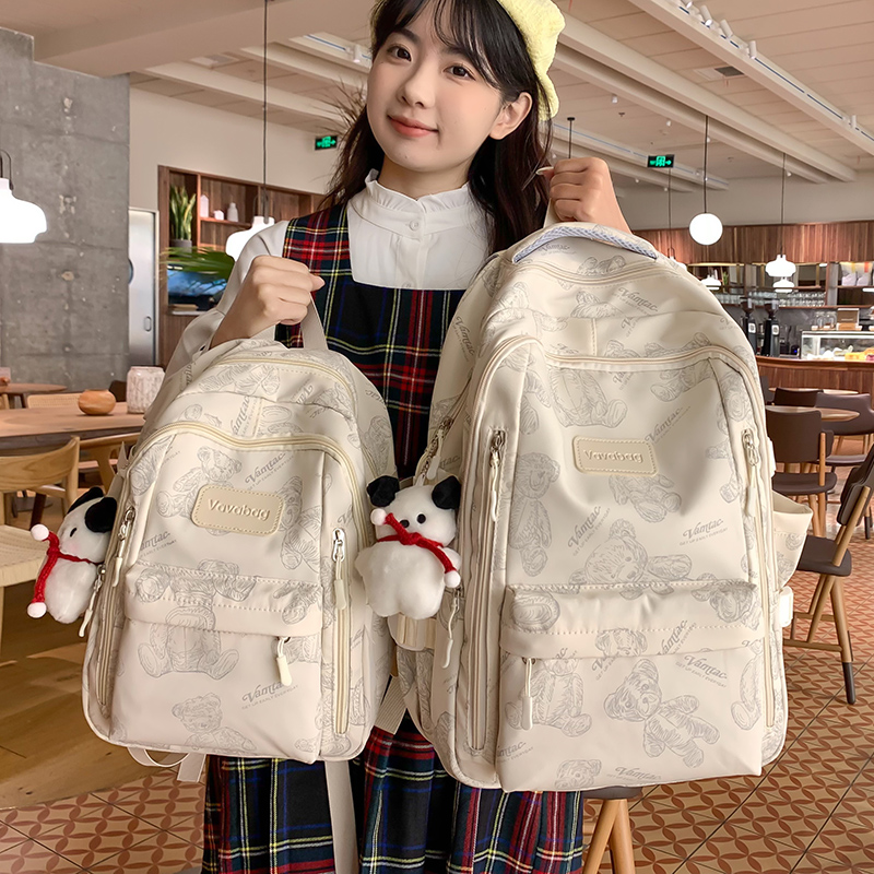 新款书包初中女生大学生高颜值可爱双肩包中小学生轻便旅游小背包