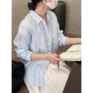 日系通勤风浅蓝色条纹长袖衬衫女韩版简约baby蓝显白宽松翻领衬衣