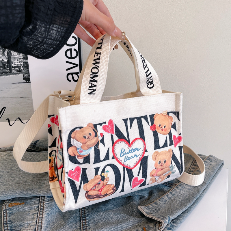 字母卡通帆布手提袋通勤斜挎小包